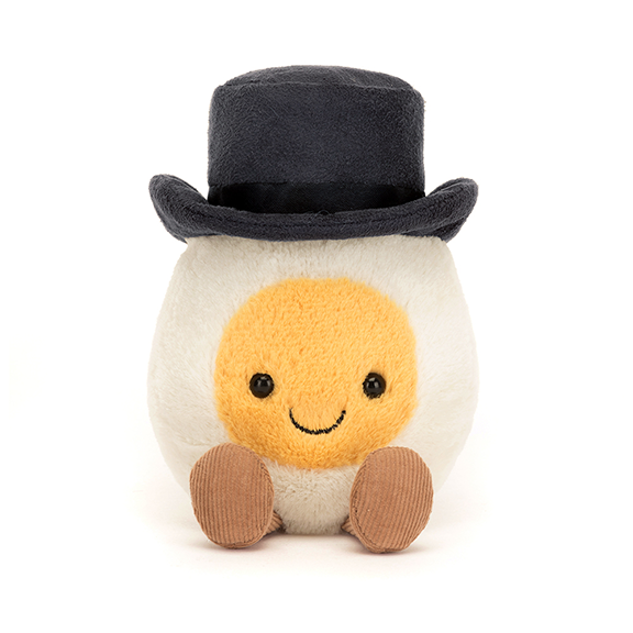 Plush toy resembling a boiled egg with a top hat on a white background
