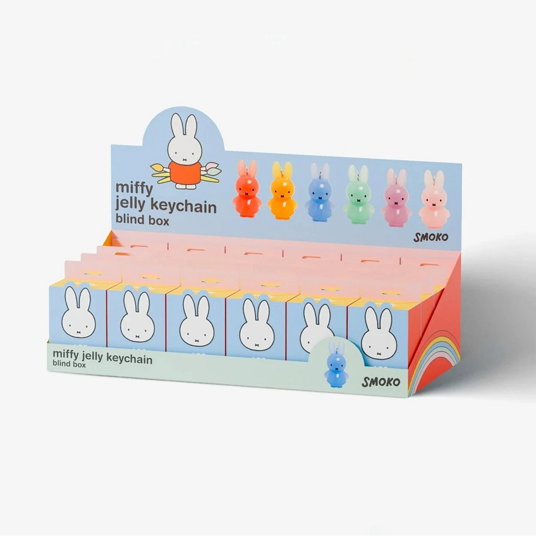 Display box of Miffy jelly keychains on a white background