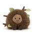 Plush toy hedgehog with green leaves on a white background