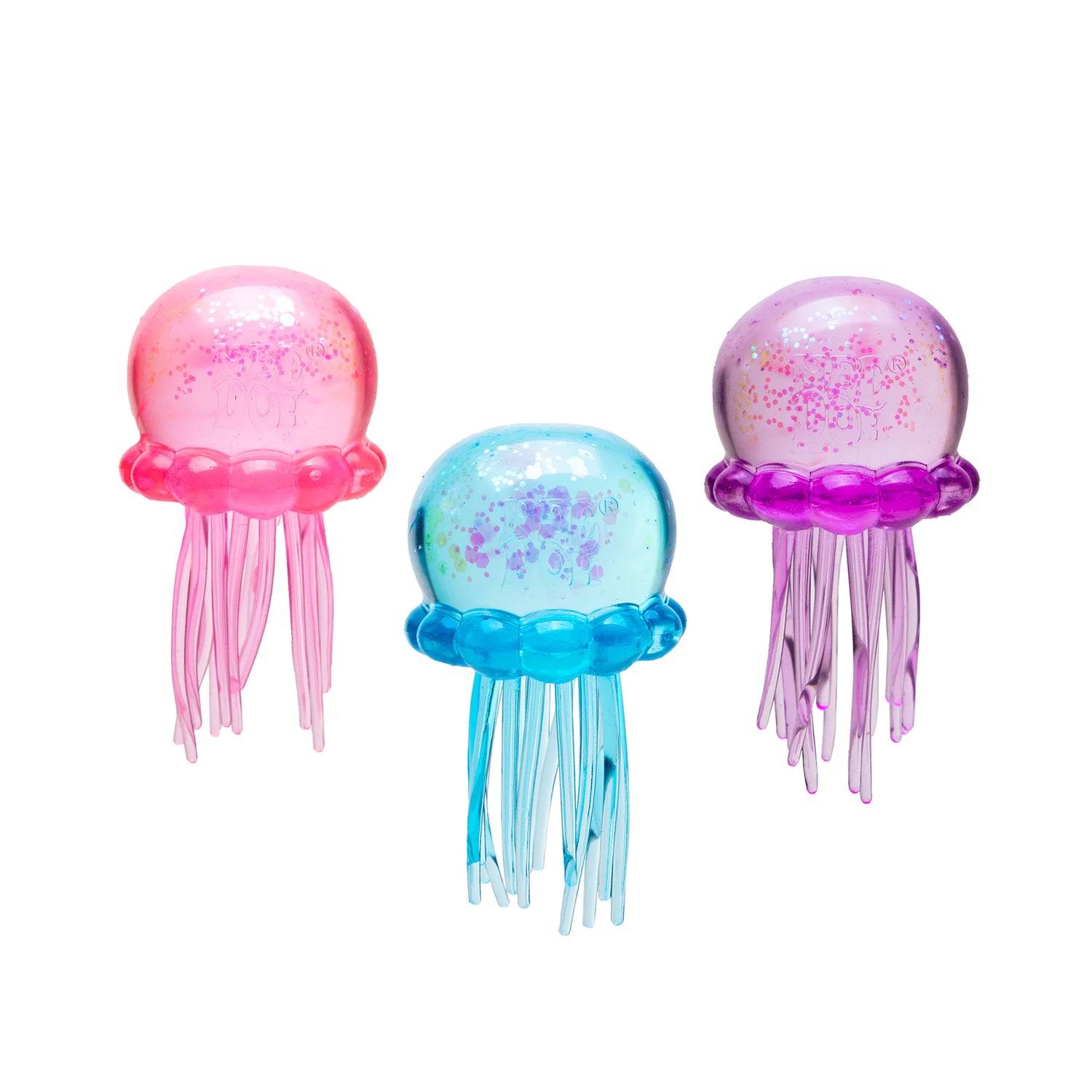Three colorful jellyfish toys on a white background