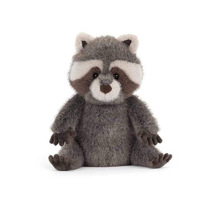 Stuffed animal raccoon toy on a white background