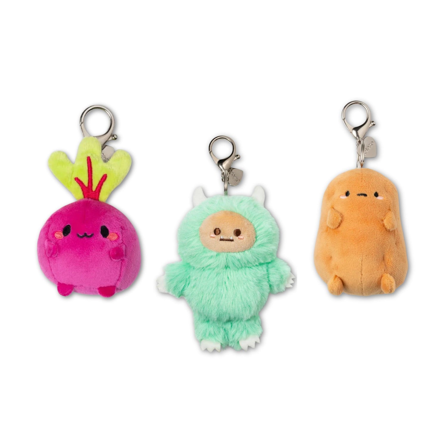 Three colorful plush keychains on a white background