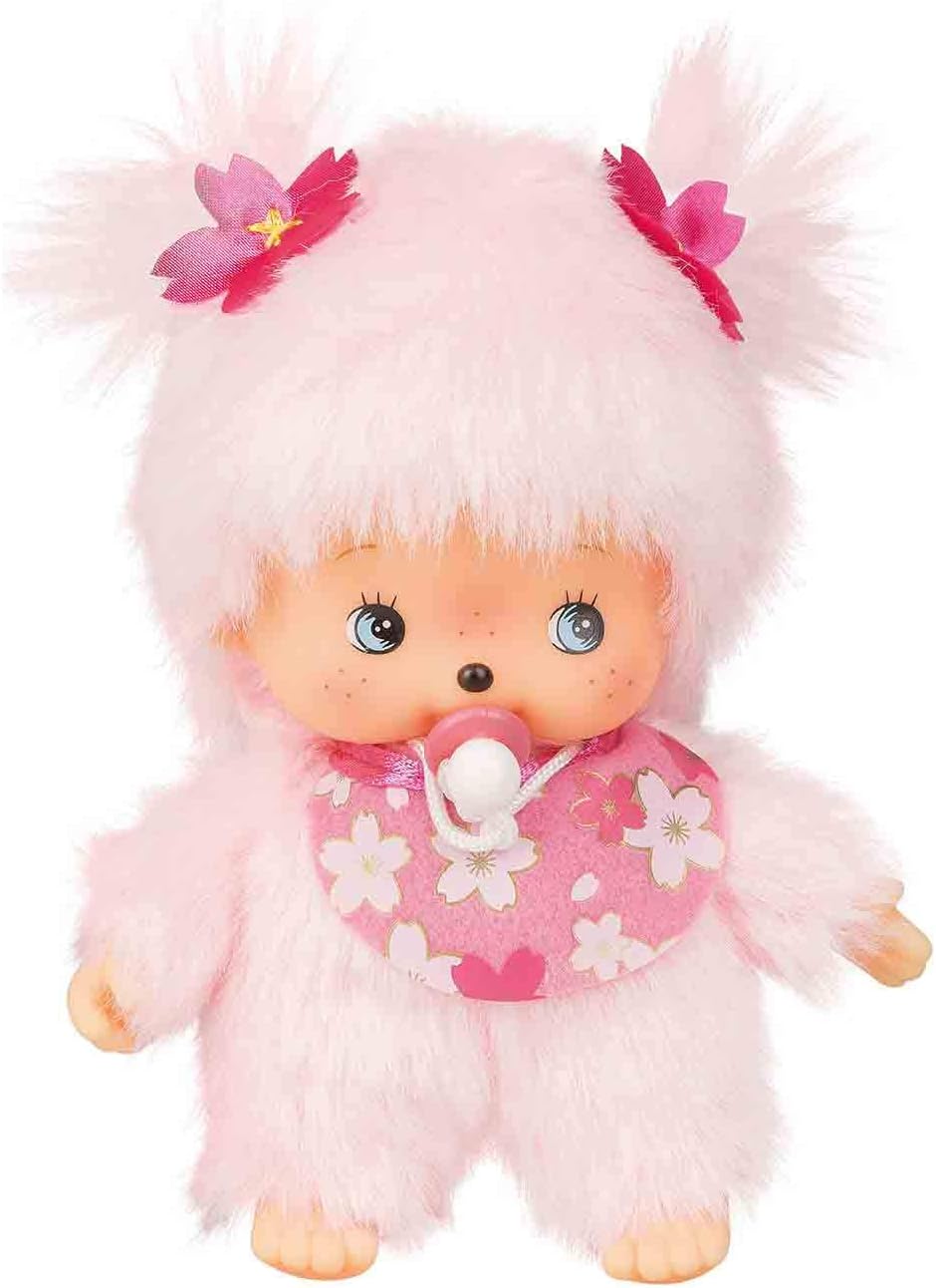 Toy doll with pink outfit and white fur, featuring a pacifier.