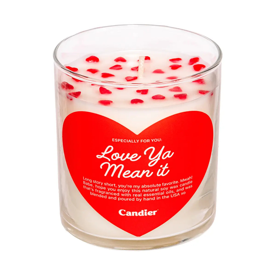 Candle with a red heart-shaped label on a white background
