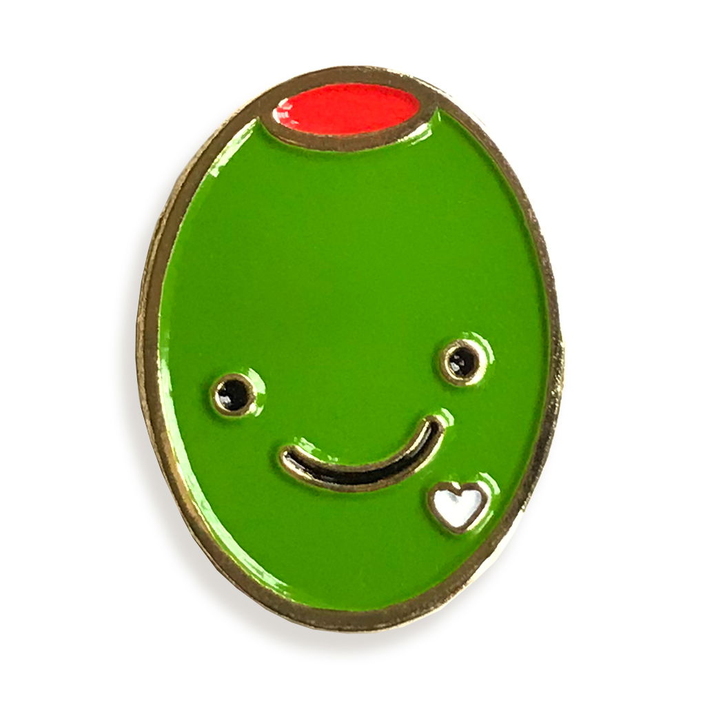 Green smiley face pin with a red dot on a white background