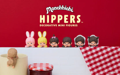 Monchhichi Hippers decorative mini figures on a red background with checkered tablecloth.