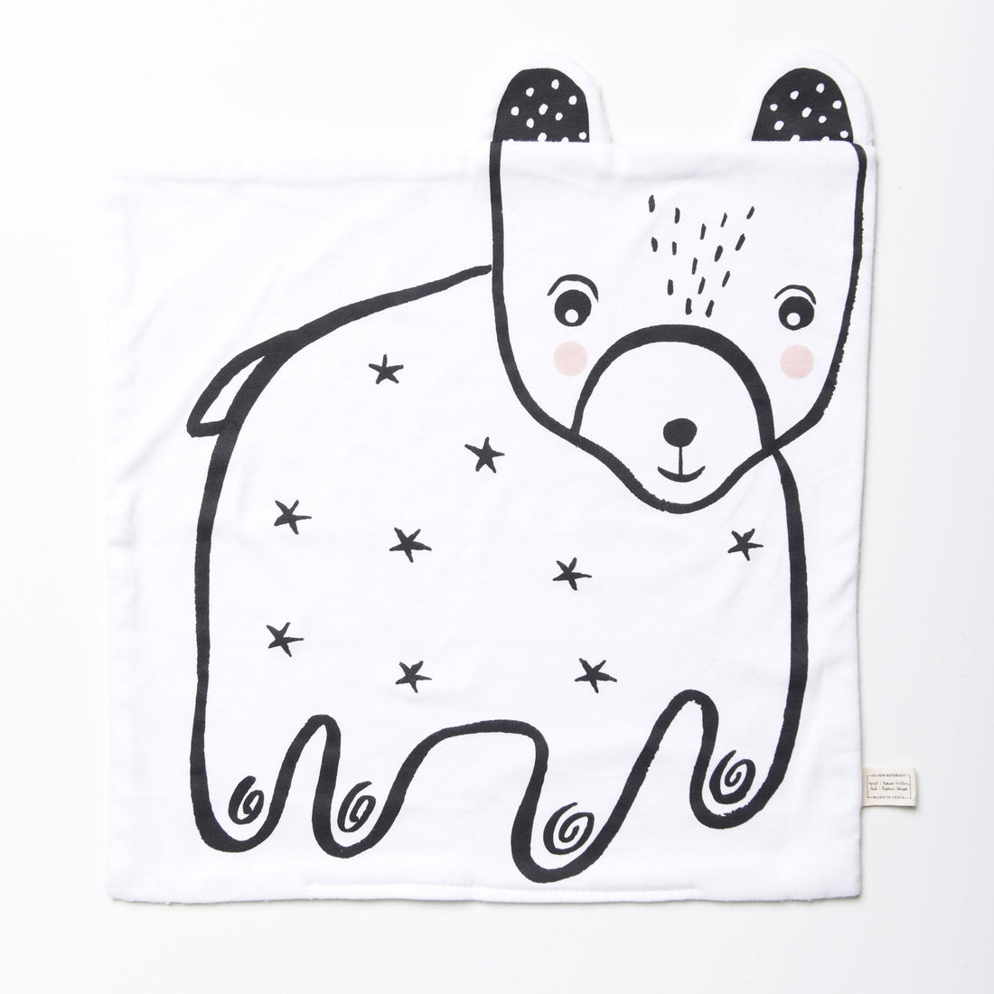 White blanket with black bear design on a white background